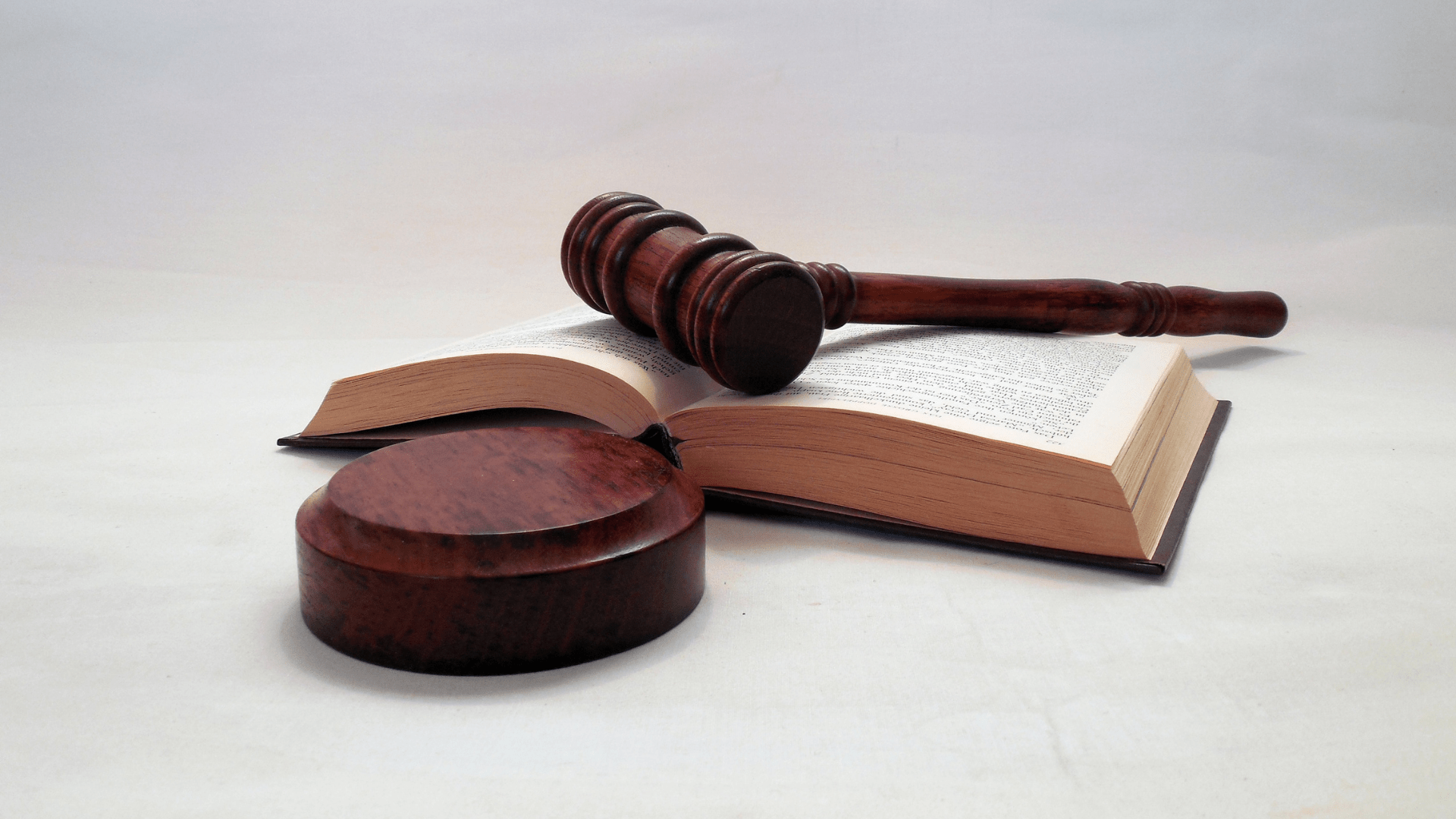 legal textbook and gavel